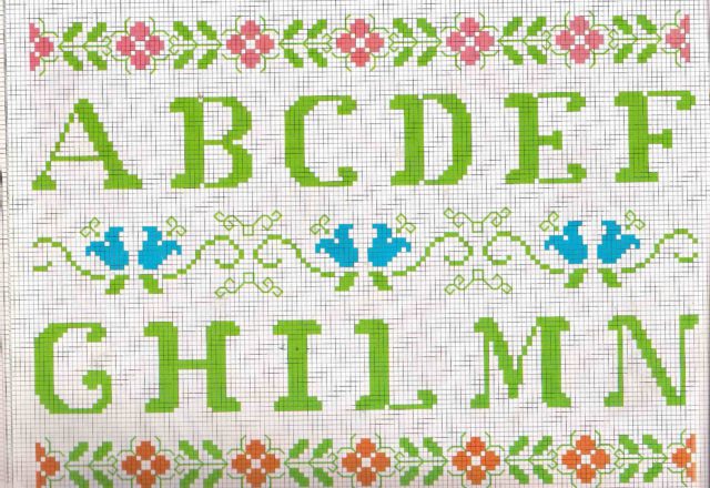 Cross stitch alphabet green letters and floreal patterns (1)