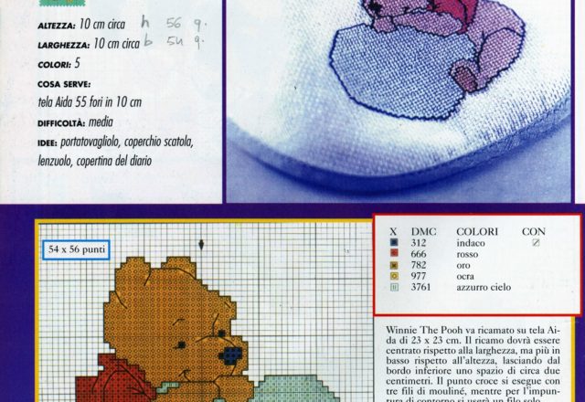 Cross stitch baby bib with Winnie The Pooh