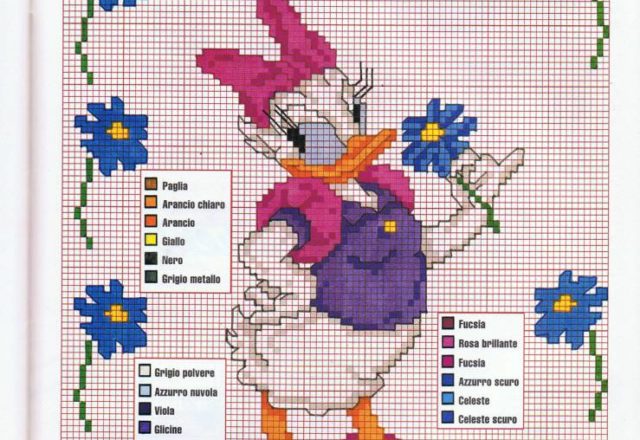 Daisy Duck among the flowers he loves me he doesn’ t love me