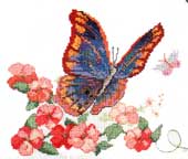 Orange butterfly between flowers cross stitch pattern (1)
