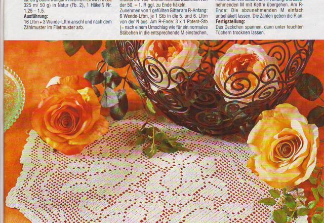Oval doily filet with a branch of roses (1)