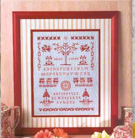 Red cross stitch sampler with various shapes and symbols (1)