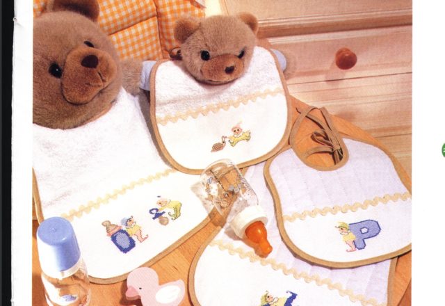 Various cross stitch patterns with goblins for baby bibs (1)