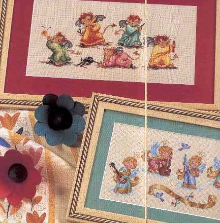 cross stich picture with angels and devils (1)