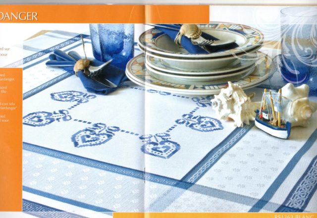 cross-stitch placemat with hearts and blue ribbons (1)