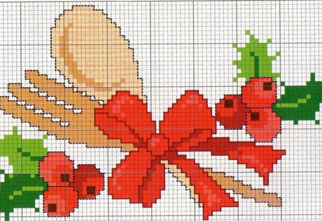 cutlery with bow and holly for Christmas