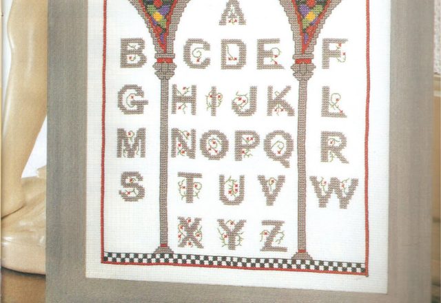 picture with a stained-glass alphabet in the window (1)